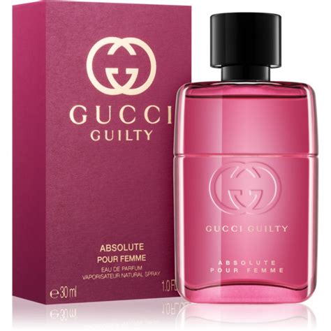 gucci perfume in red bottle.